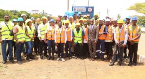 Some of the graduates with their instructors and officials at the graduation event