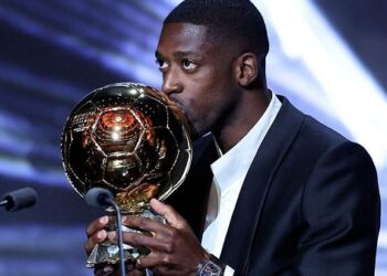 Ousmane Dembele with his Ballon d'Or trophy