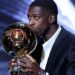Ousmane Dembele with his Ballon d'Or trophy
