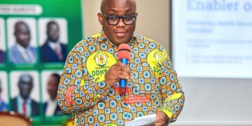 Dr. Victor Asare Bampoe, Chief Executive Officer of the National Health Insurance Authority (NHIA), speaking at the function