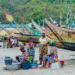 Fishing canoes docked at a landing beach in Ghana