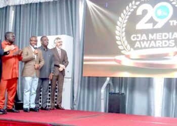 Felix Kwakye Ofosu (centre), Minister for Government Communications, launches the 29th Ghana Journalists Association (GJA) Awards, joined by GJA President Albert Kwabena Dwumfour (second left), Oheneba Kwaku Duah (left), Managing Director of Ashanti Green Initiative, and other dignitaries.