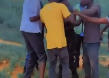 A police officer being assaulted