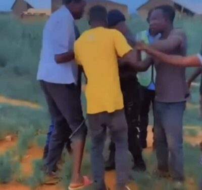 A police officer being assaulted