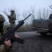 A serviceman of the 93rd Kholodnyi Yar Separate Mechanized Brigade of the Ukrainian Armed Forces checks the sky as he looks out for Russian combat drones near the frontline town of Kostiantynivka in Donetsk region, Ukraine November 27, 2025. © Reuters