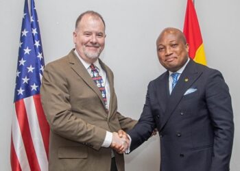 Ghana's foreign Minister, Samuel Okudzeto Ablakwa (right) in a handshake with Acting US Ambassador to Ghana, Rolf Olson