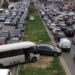 Vehicles stuck in traffic after Israel's military issued 'evacuation' orders of entire neighborhoods in Beirut's southern suburb on March 5, 2026. © Claudia Greco, Reuters