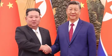 Chinese President in a handshake with the North Korea President
