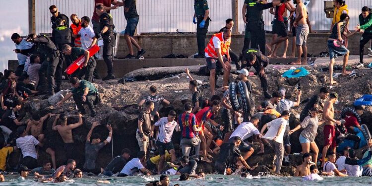 Spain’s Ceuta sees migrant ‘invasion’ – Politico